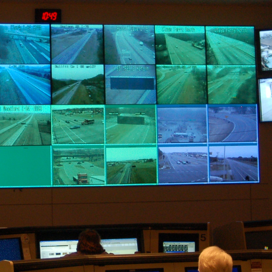 A wall of video monitors displaying live traffic feeds